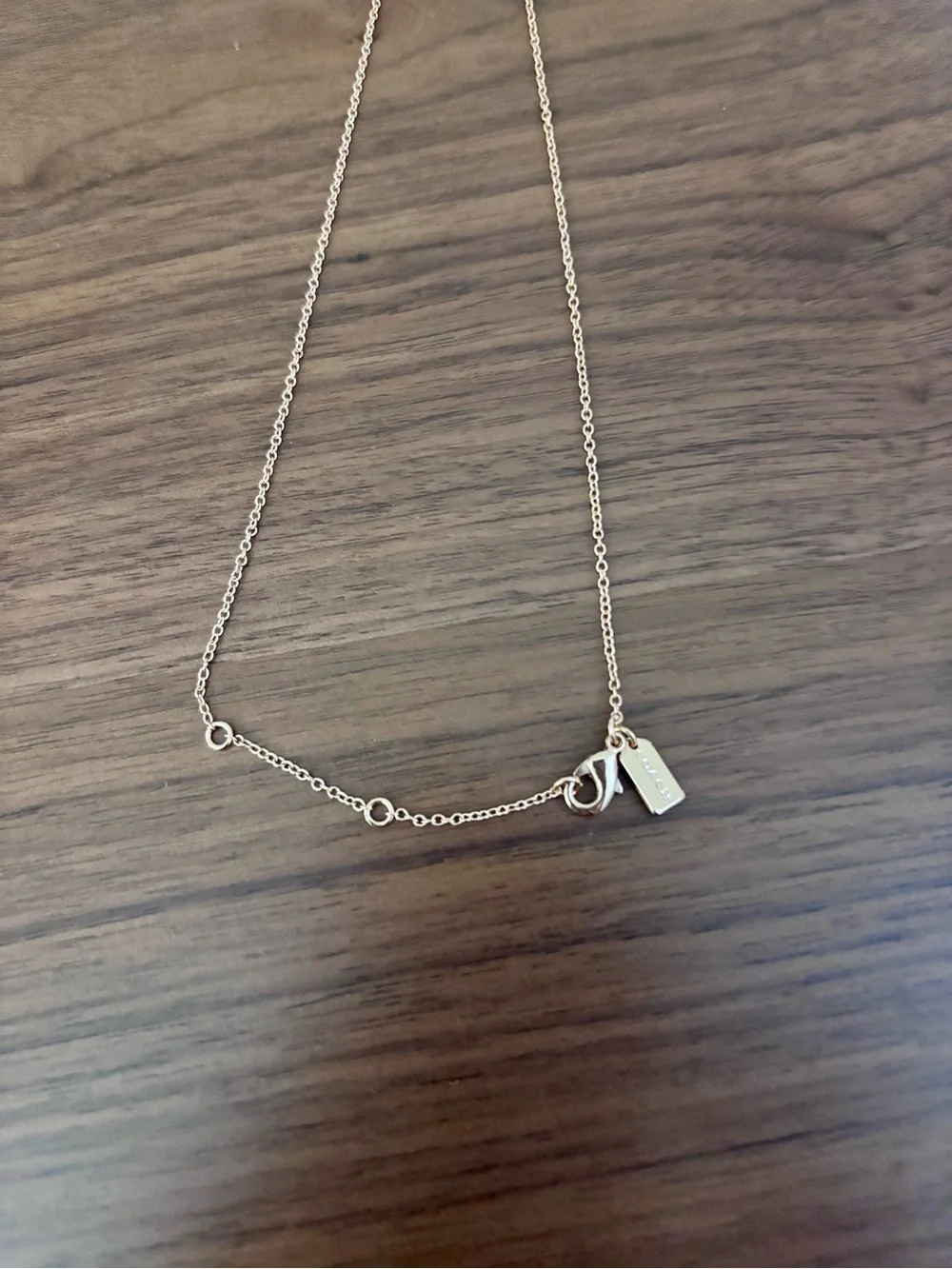 Coach Rose Gold Solitaire Pendant Necklace with Pouch